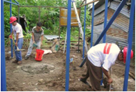 men building habitat, simply help non-profit org, ngo, landmark forum graduates making a difference